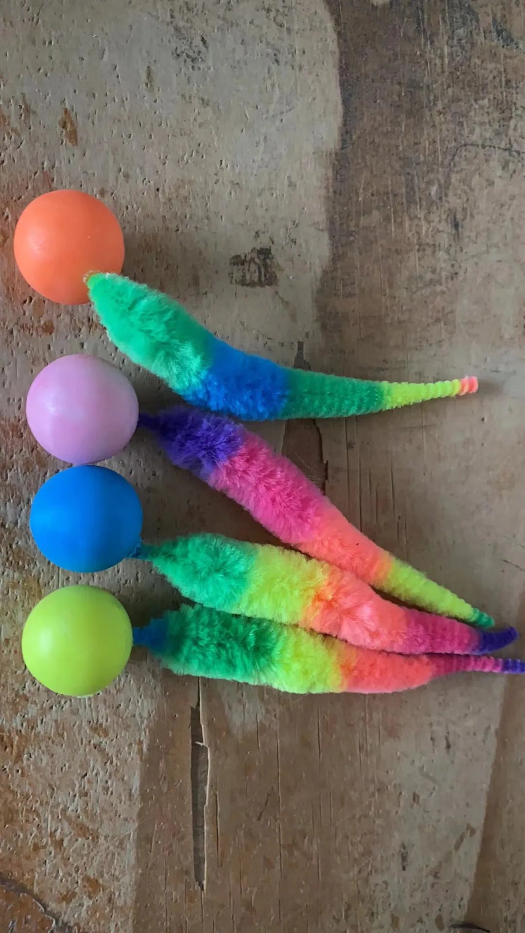 Bouncy fuzzy worm ball cat toy