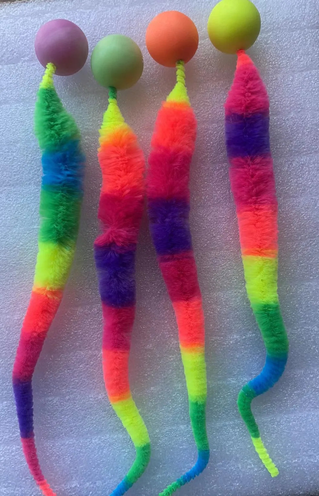 Bouncy fuzzy worm ball cat toy