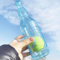 Bottle Crunch TPR dog toy with tennis ball inside
